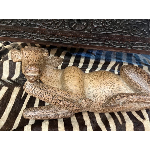 The carving is in perfect shape with removable antlers. It was carved from the trunk of a palm tree. This is a very...
