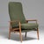 A beautifully designed mid-century armchair attributed to A. Svensson, featuring a contoured form for ergonomic comfort....
