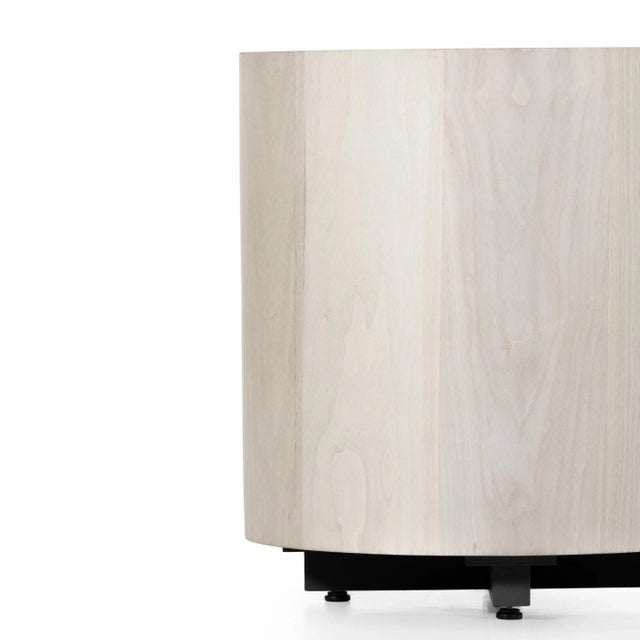 Stunning forces of nature are captured in a rounded end table of ashen walnut. Reflective of woods' natural character, a...