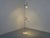 A minimalist floor lamp by Edi Franz for Swiss Lamps International from the 1960s, adjustable in angle and height. Both...