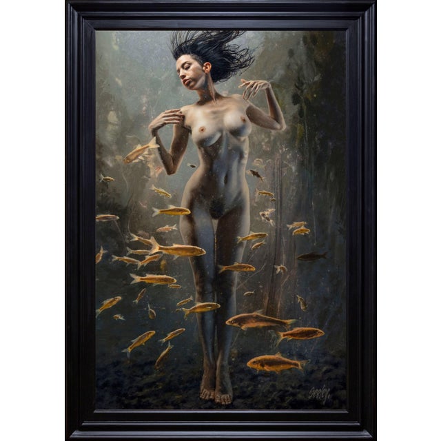 The artwork depicts a serene figure of a woman submerged in a tranquil underwater setting, surrounded by a school of fish...