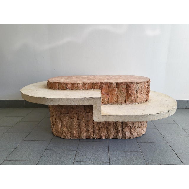 Fair condition. Numerous signs of wear and chips, particularly on the outer edge of the cream-beige tabletop. The reddish-...