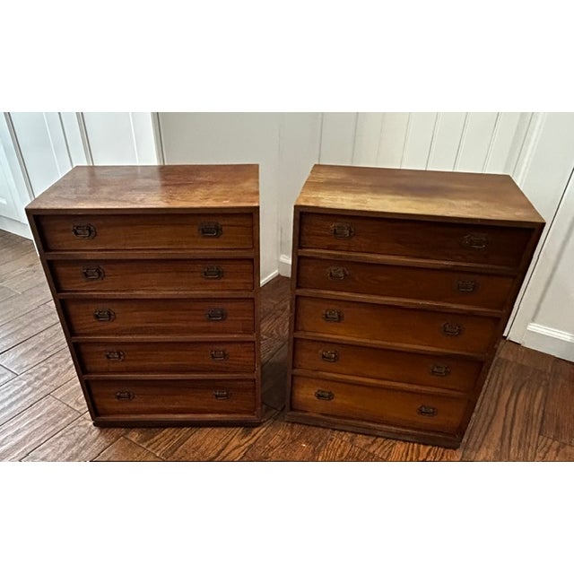 "An exceptionally rare, perfectly matched pair of Japanese Shōwa-era (1960s) modern tansu chests. These exquisite chests...