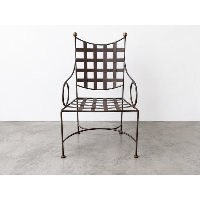 A rare and highly collectible set of six vintage Italian wrought iron garden dining armchairs designed in the style of...