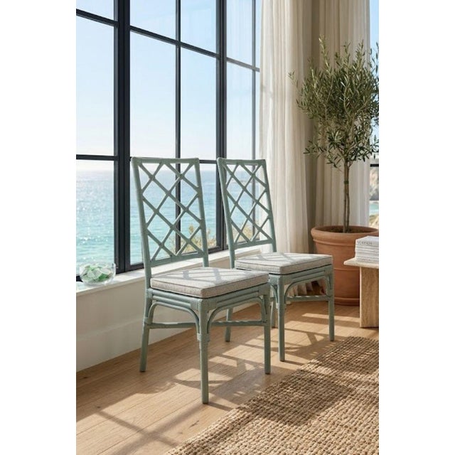 Must-have pair of vintage accent chairs! Gorgeous light blue-green color with a classic Chinoiserie lattice back. Solid...