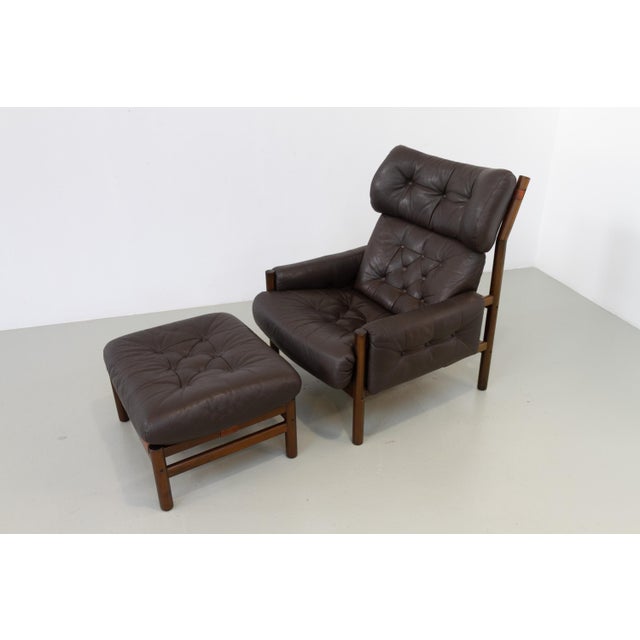 Scandinavian Mid-Century Safari Lounge Chair and Stool by Bruksbo, Norway. 1970s Very rare Model Tunis leather lounge...