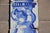Baroque Antique 18th Century Set of Four Tiles Depicting a Cherub Holding a Baroque Torchiere For Sale - Image 3 of 6