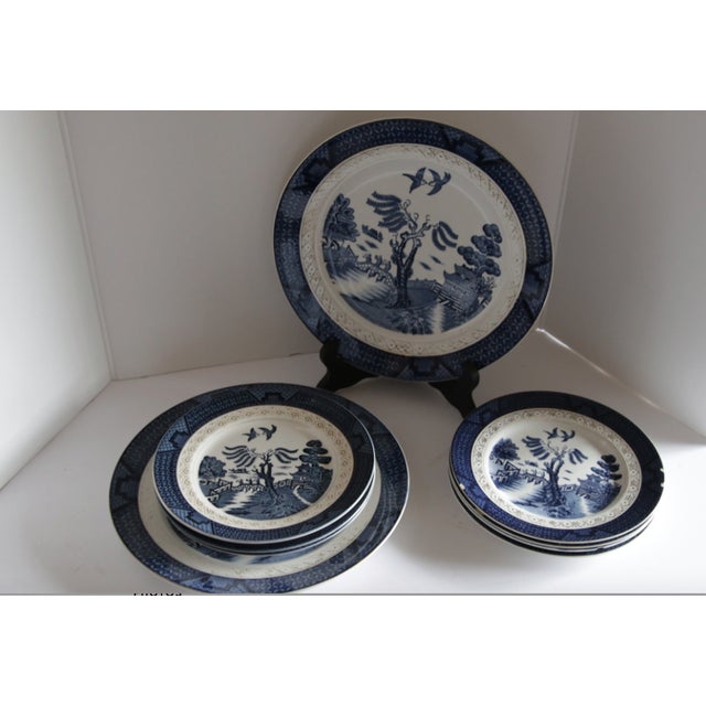 Burleigh Blue Willow dinner set is vintage in the Canton pattern. There are 9 pieces, including 2 dinner plates and 7...