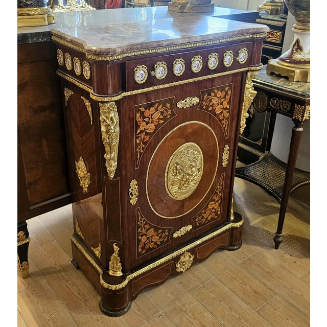 Grace your home with the timeless beauty of this French Louis XVI Commode Cabinet, an extraordinary piece that blends fine...