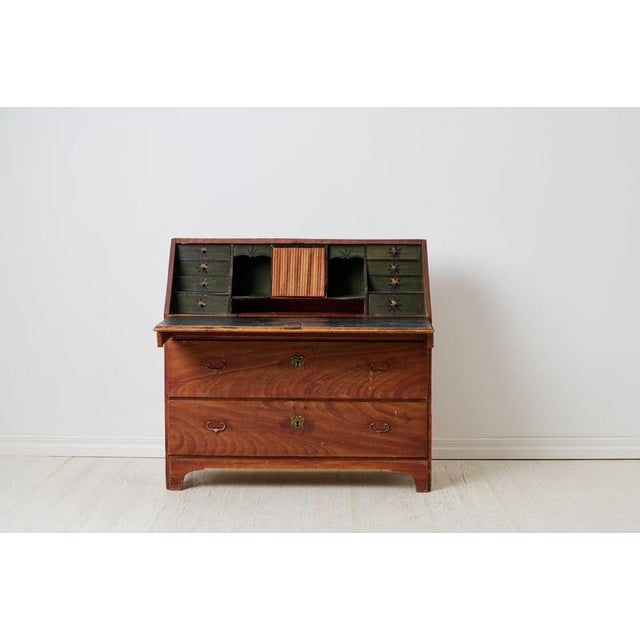 Country house secretary chest from the early 1800s. Made by hand in northern Sweden around 1840 with two large and...