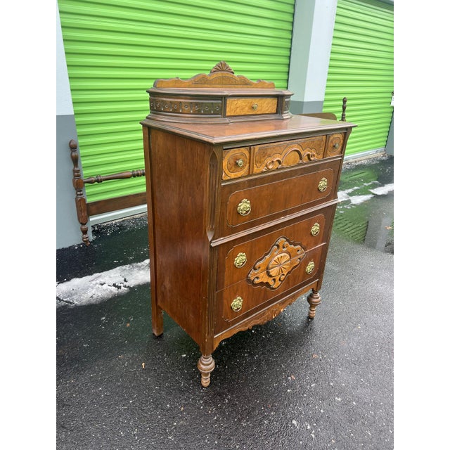 This is a richly detailed late-19th-century Victorian cabinet, most accurately described as a Victorian washstand or small...