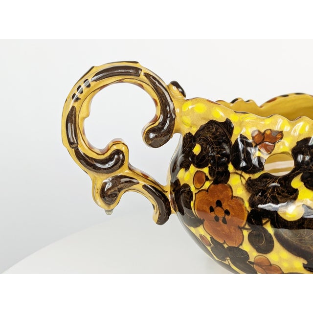 Large hand-decorated ceramic centerpiece produced by MGA (Giuseppe Mazzotti Albisola) in the 1920s and 1930s. The phyto-...