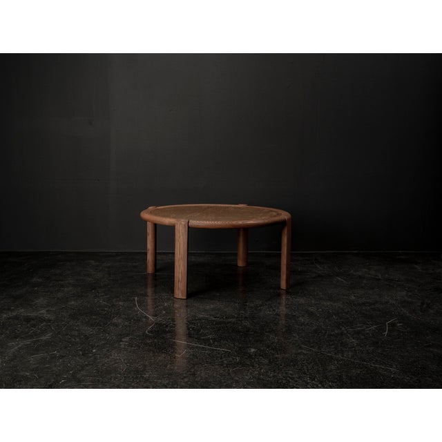This exceptional coffee table from the 1960s embodies a powerful blend of brutalist expression, rustic character, and a...