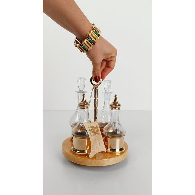 Rare cruet set designed by Aldo Tura during the Mid-20 Century Modern period, a piece that will not go unnoticed on your...