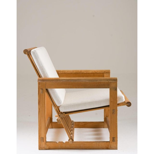 Scandinavian lounge chair in pine, model "Trybo" by Edvin Helseth, 1960s. The "Trybo" series was designed in 1964 for the...