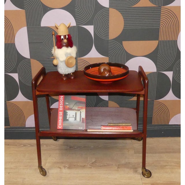 Charming little bar or tea trolley with magazine rack in a stunningly beautiful design Design classic - Item no. 6530 by...