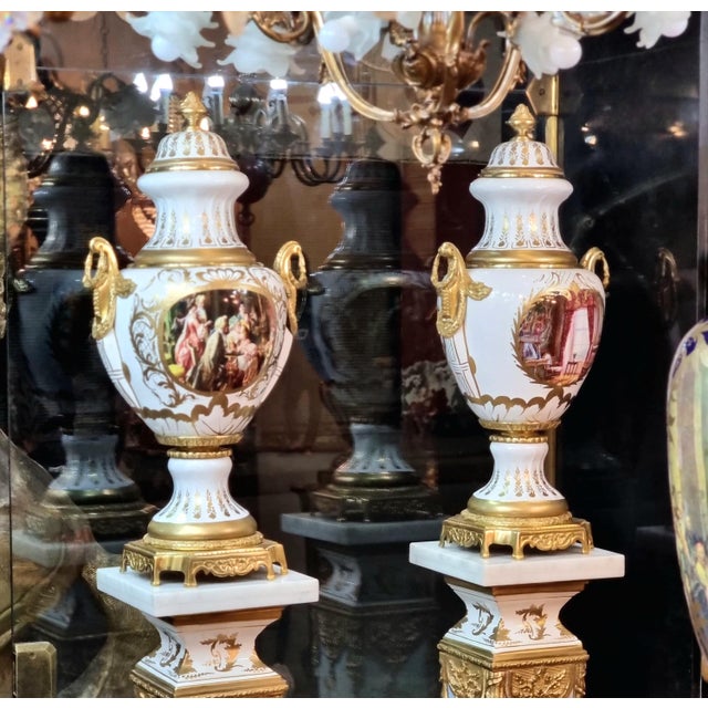 Bring timeless French elegance into your home with this exquisite hand-painted porcelain lidded vase, featuring a graceful...