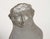 Mid-Century Modern cut steel sculpture depicting a man in bell bottom pants standing casually with a cigarette in his...
