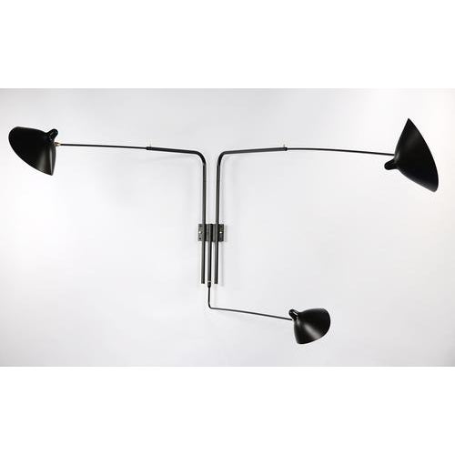 Wall lamp model 'three rotating straight arms wall lamp' designed by serge mouille in 1954. Manufactured by editions serge...