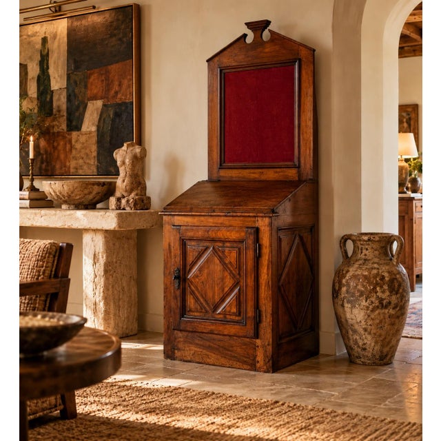 Beautiful 18th-century French Country cabinet, crafted in what appears to be solid walnut wood, featuring a rich, warm...