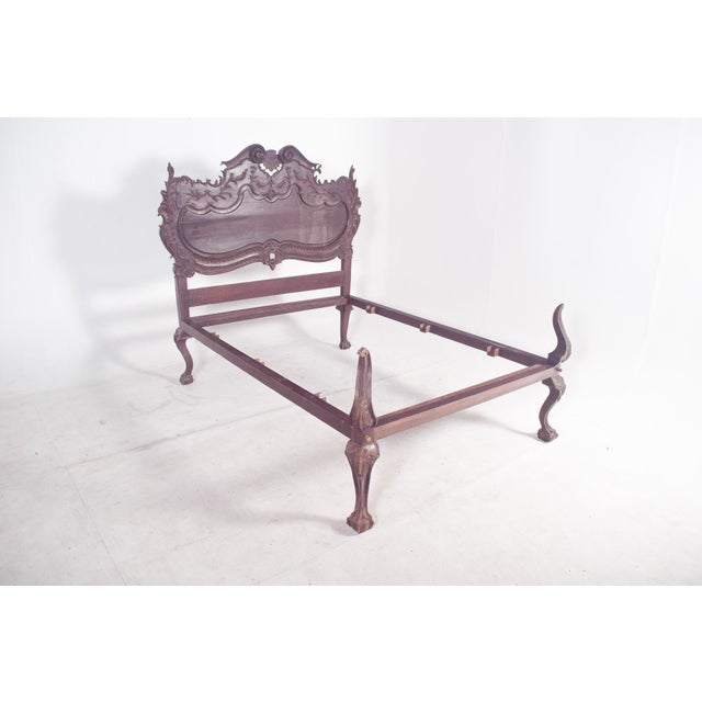 This double bed, crafted in the style of Dom José, showcases the elegance and decorative richness characteristic of 18th-...
