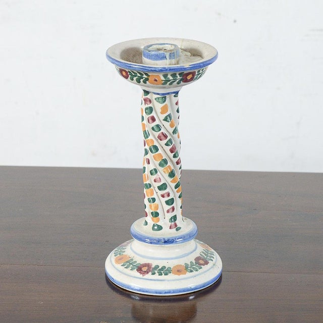 This majolica ceramic candle holder represents a fine example of abruzzo's artistic craftsmanship, ideal for collectors of...
