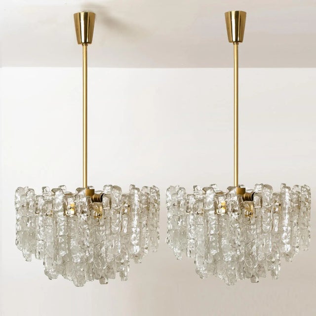 Unique and elegant modern high-end brass colored set of light fixtures, manufactured by kalmar, austria in the 1970s....