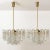 Unique and elegant modern high-end brass colored set of light fixtures, manufactured by kalmar, austria in the 1970s....
