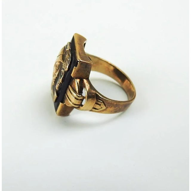 Vintage early 20th century 10K gold and black onyx ring, size 8.5. Gold man and woman relief profile on black onyx, marked...