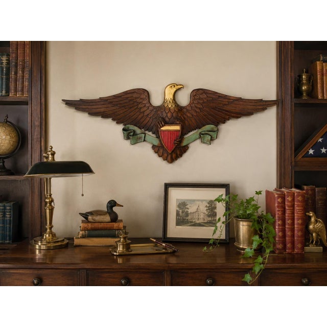 Striking vintage American eagle wall plaque by Sexton, featuring an impressive 26.75-inch wingspan and beautifully...
