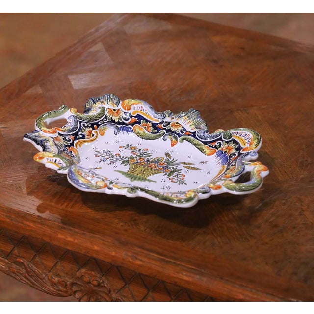 Decorate a console, dining table, or wall with this elegant antique French Rouen faience serving tray, crafted circa 1880....