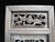 Chinese carved wood window screen or art panel. Pierced natural wood with several different carved scenarios. The upper...