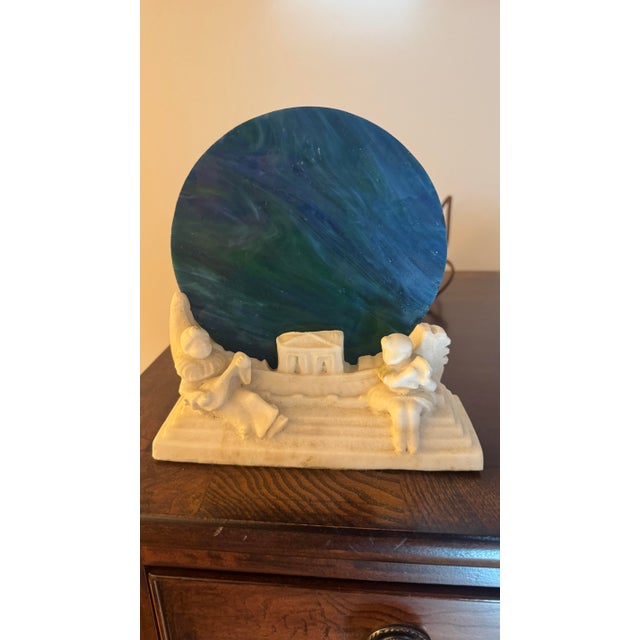 An extraordinary, highly collectible matching pair of genuine 1920s–1930s Art Deco figural accent lamps. The sculptural...