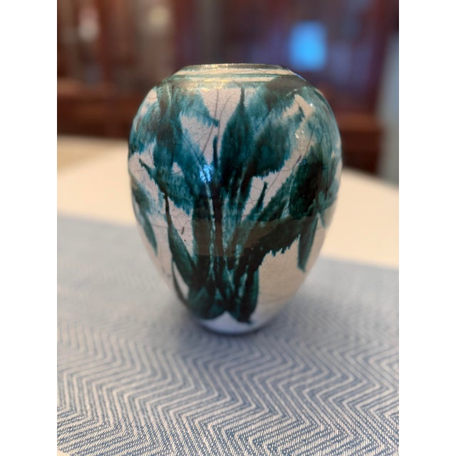 Raku ware is a type of Japanese-inspired pottery traditionally associated with the Japanese tea ceremony, characterized by...