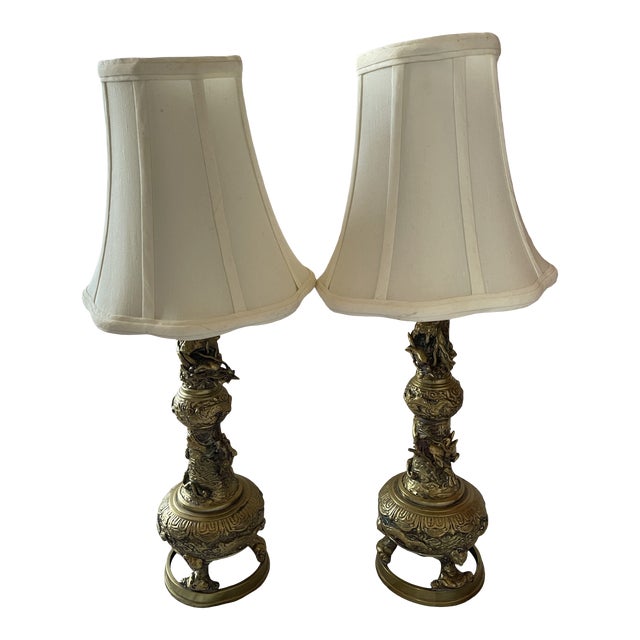 A Pair of 1950s Carved Bronzed Brass Lamps For Sale