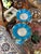 This is a charming pair of antique French Opaline glass vases in blue and white, with a delicate gold painted rime and...