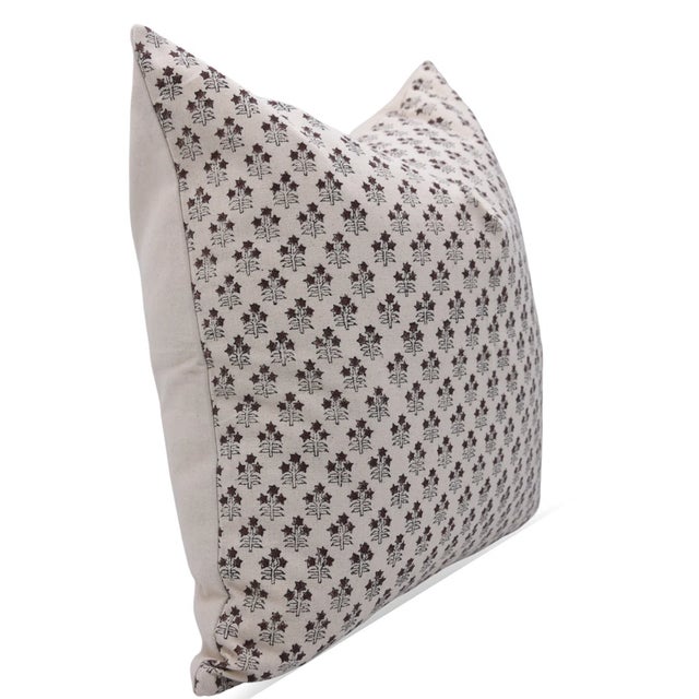 The Kesariya cushion cover celebrates the warmth and vibrance of saffron hues with a striking hand block printed design...