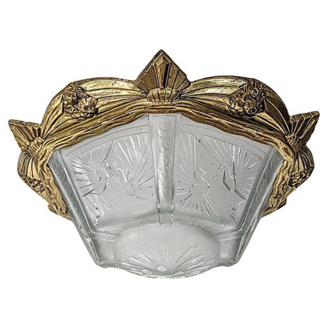A stunning French Art Deco flush mount was created by the French artist "Muller Freres" in great condition. The fixture is...