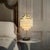 Black Aloadecor 3-Light 28'' Modern Coastal Aged Brass Natural Capiz Shell Tiered Table Lamp With Black Marble Base Glam For Sale - Image 8 of 8