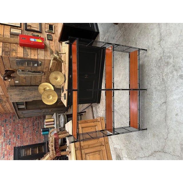 This 60's shelf has been completely restored It shows some signs of use which contribute to its patina It can be...