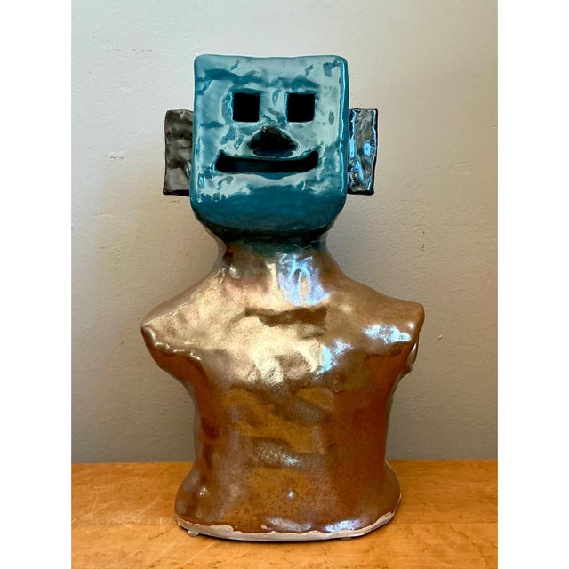 This vintage abstract ceramic bust sculpture presents a compelling exploration of form, pairing a bold, geometric block...