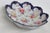 This gorgeous Scalloped Painted Dish / Bowl is made of porcelain. This stunning piece features a hand painted bouquet...