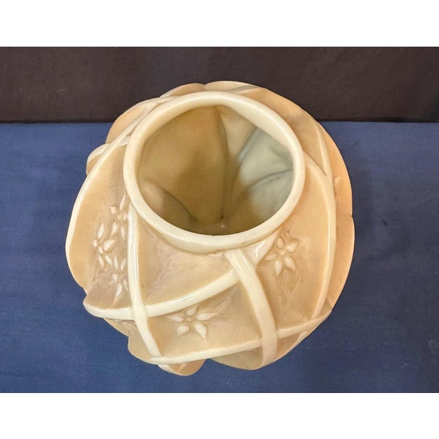 This vintage Art Deco art glass vase was created by the Phoenix Consolidated Glass Co.. The stunning “squatty” shape vase...