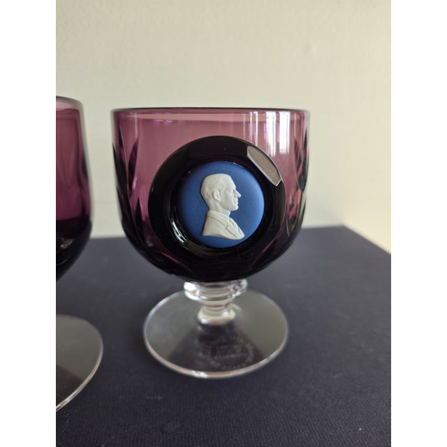 Pair of Amethyst Goblets that are hand cut and bear Royal blue and white Jasper cameos of Hm the Queen and HRH the Duke of...