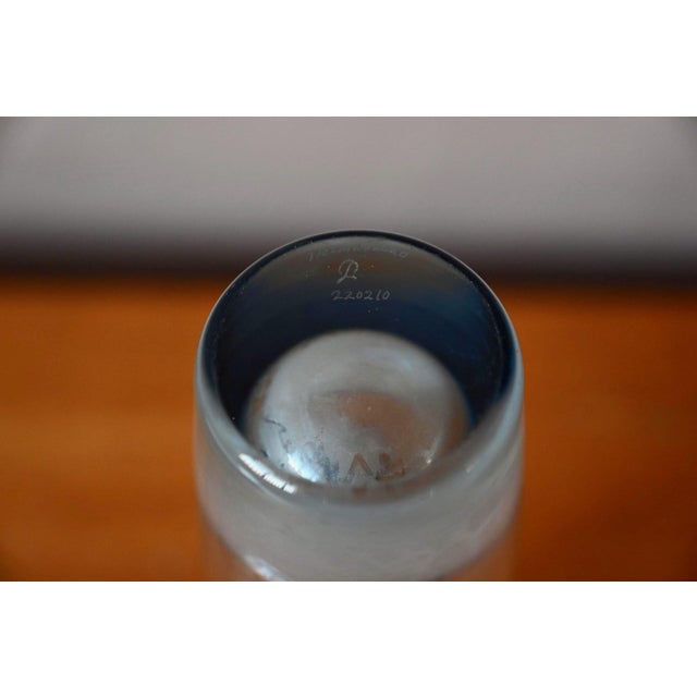 This beautiful glass vase by Per Lütken is an artistic Holmegaard piece from the 1950s. Featuring soft, organic shapes and...