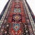 This exceptional antique Kazak runner, approximately 120 years old, is a rare example of highly detailed Caucasian...