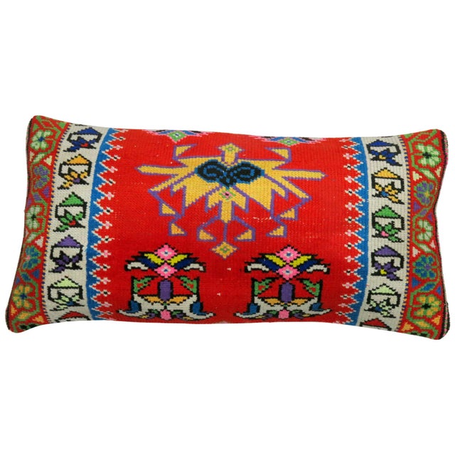 Large pillow made from a vintage Turkish Anatolian rug. Measures: 16 x 32''.