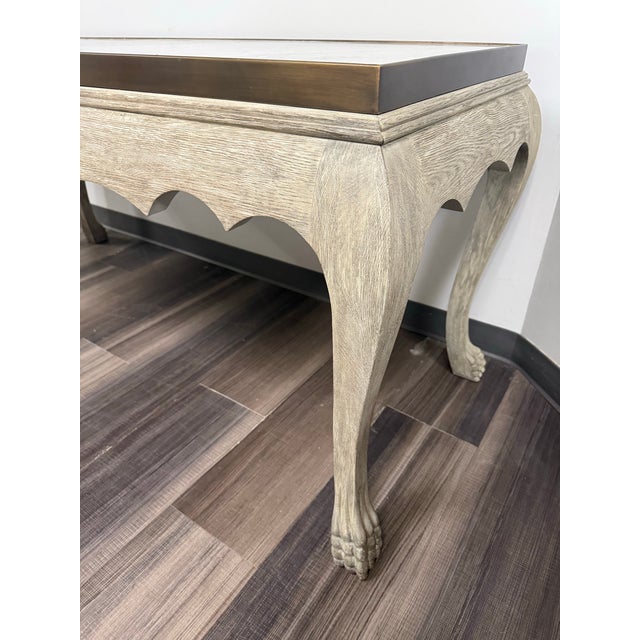 The Jonathan Charles Eden Console Table blends refined craftsmanship with timeless elegance. Finished in a sophisticated...