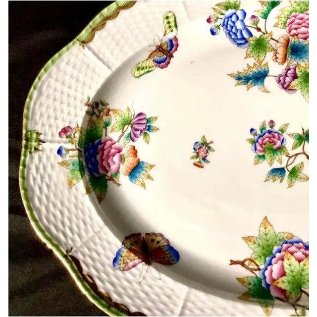20th-Century Herend Queen Victoria Hand-Painted Porcelain Platter. Platter is 14 inches in length and has a butterfly and...