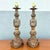 A stunning pair of vintage chinoiserie-inspired table lamps, exquisitely crafted with ornate gold gilt metalwork and...